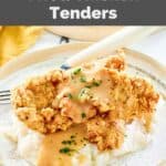 Homemade Cracker Barrel fried chicken tenders topped with gravy over mashed potatoes.