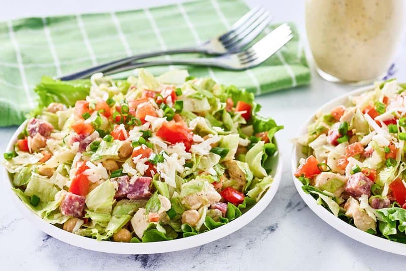 Copycat Cucina Cucina chopped salad in bowls.