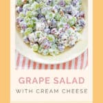 Grape salad with cream cheese dressing on a platter.