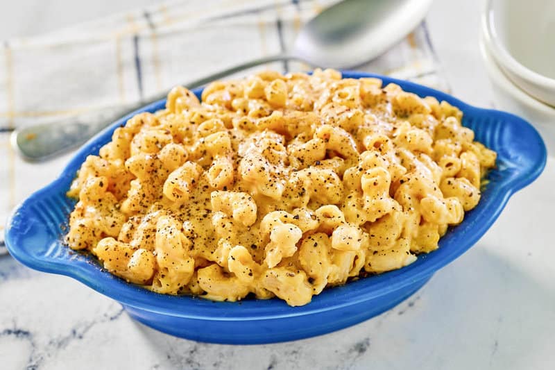 Homemade mac and cheese in a small serving dish.