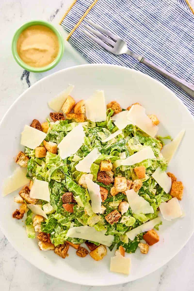 Copycat Houston's Caesar salad with spicy Caesar dressing on a plate.