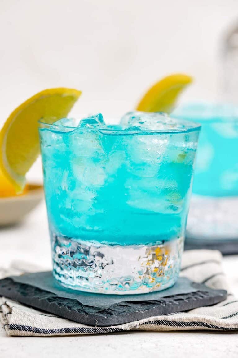 Copycat Olive Garden Blue Amalfi drink on a coaster.