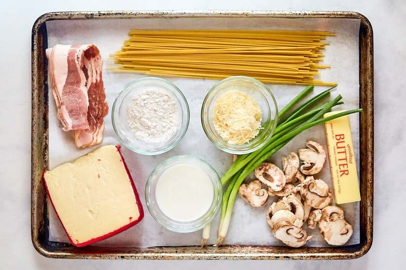 Copycat Olive Garden carbonara ingredients on a tray.