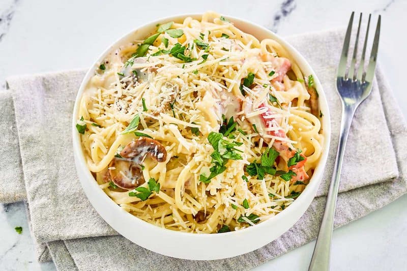Copycat Olive Garden carbonara pasta in a bowl.