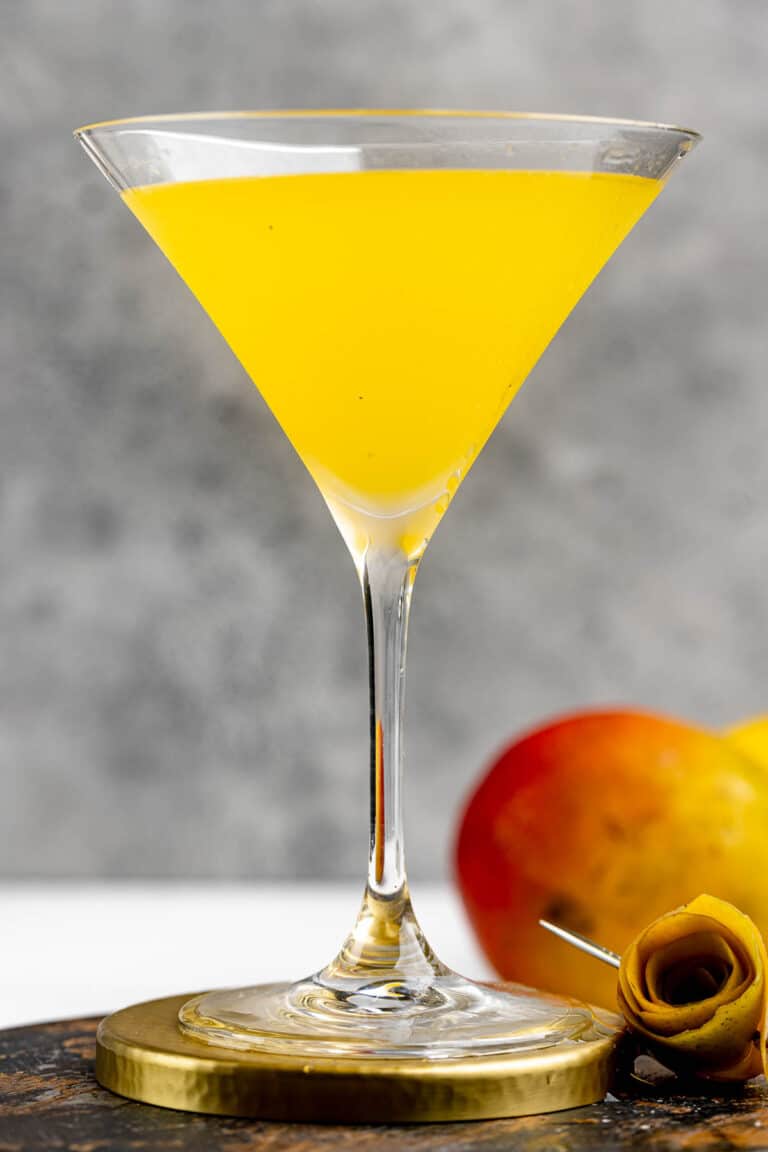 Copycat Olive Garden mango martini and a mango.