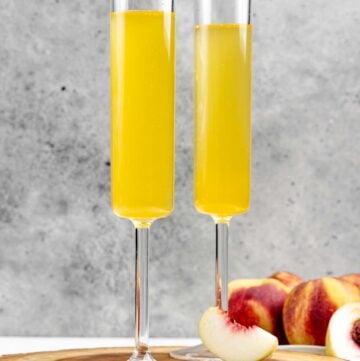 Two copycat Olive Garden peach bellini drinks.