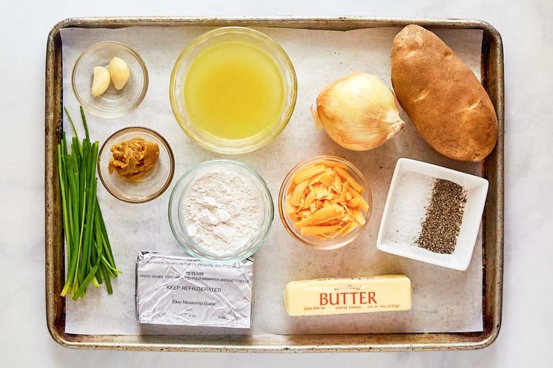 Copycat Panera baked potato soup ingredients on a tray.