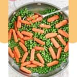 Homemade buttery peas and carrots in a large skillet.