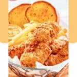 Homemade Whataburger chicken strips in a basket with fries and toast.