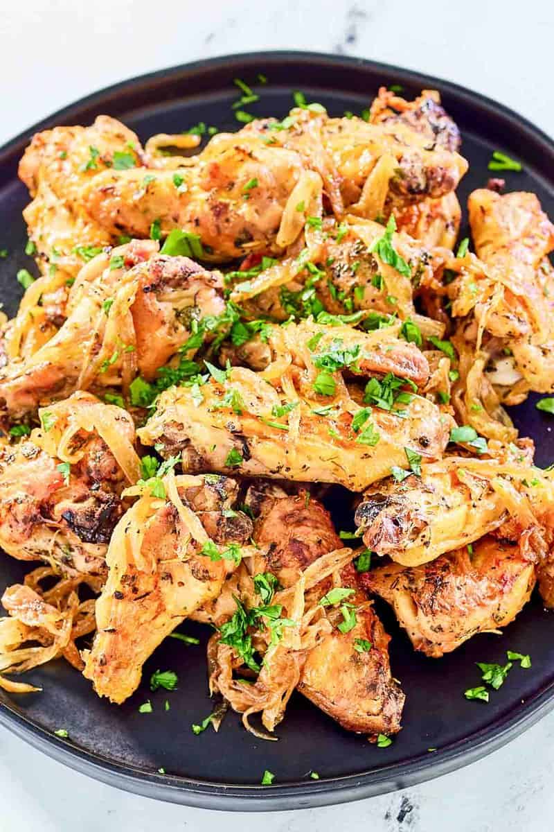 Copycat Anthony's coal fired chicken wings on a plate.