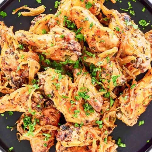 Copycat Anthony's coal fired wings on a large plate.