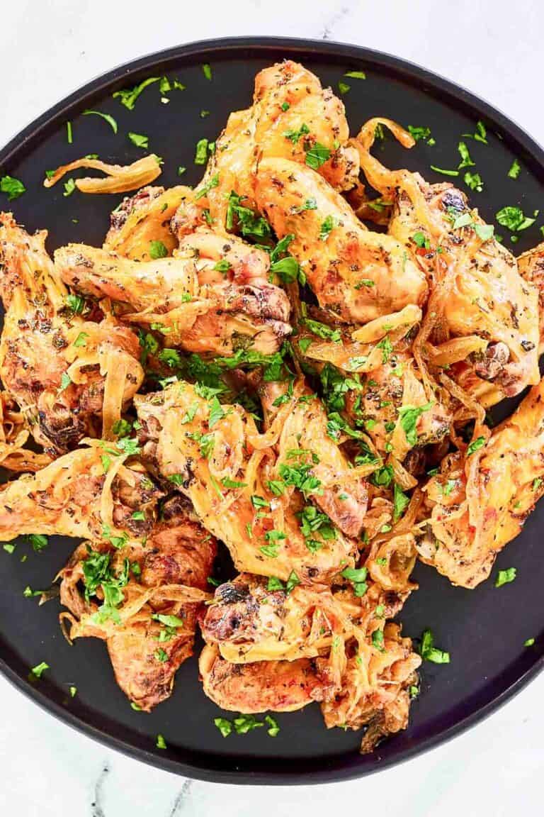 Copycat Anthony's coal fired wings on a large plate.