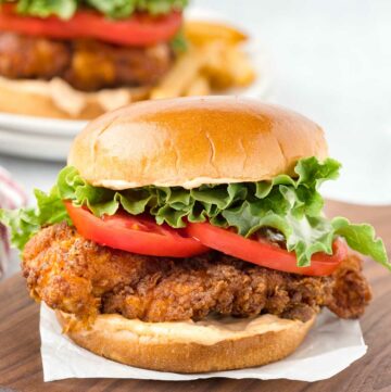 Copycat Burger King BK royal crispy chicken sandwich on a wood board.