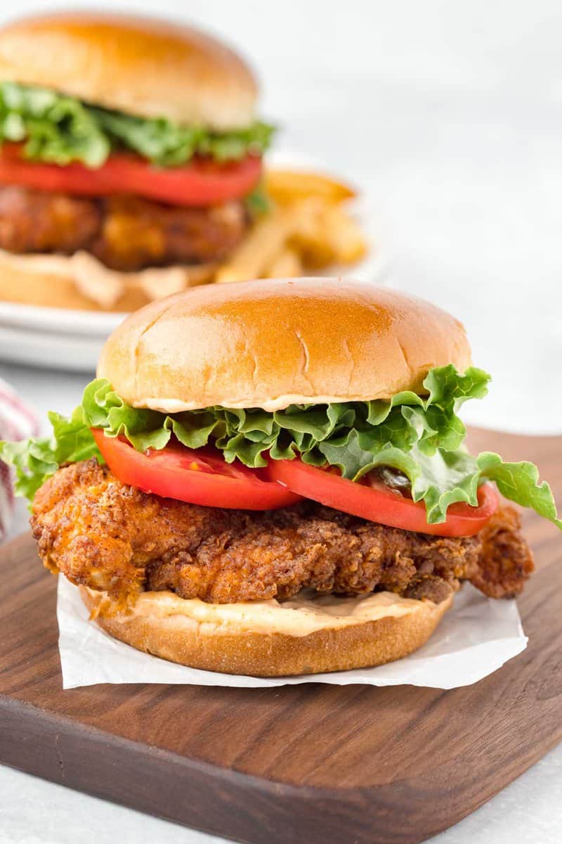 Copycat Burger King BK royal crispy chicken sandwich on a wood board.