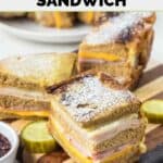 Three slices of homemade Bennigan's Monte Cristo sandwich on a wood board.