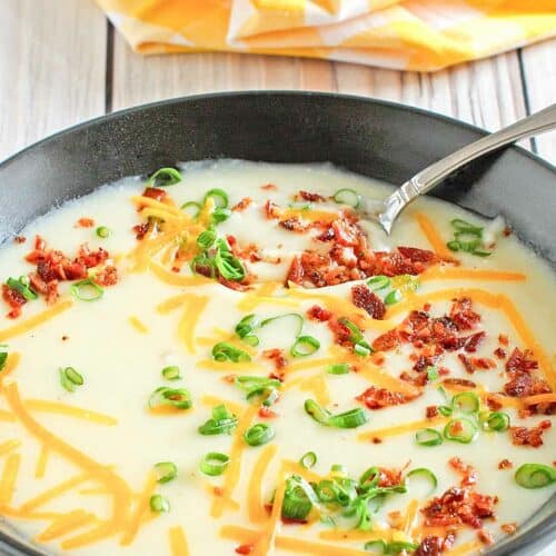 A bowl of copycat Bennigan's ultimate baked potato soup.