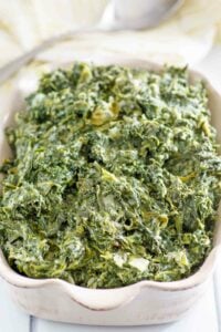 Copycat Boston Market creamed spinach in a baking dish.