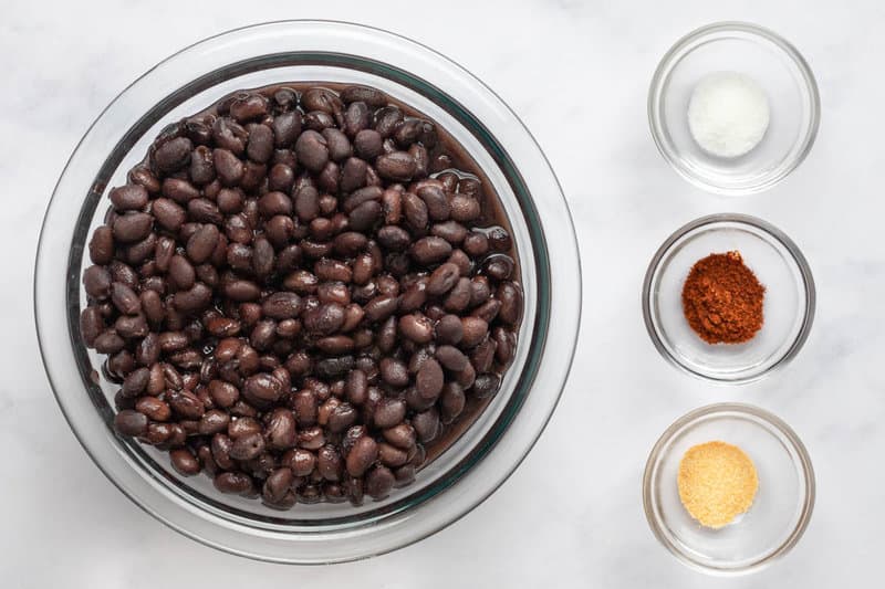 Copycat Chili's black beans ingredients in bowls.