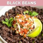 A bowl of homemade Chili's black beans garnished with pico de gallo.
