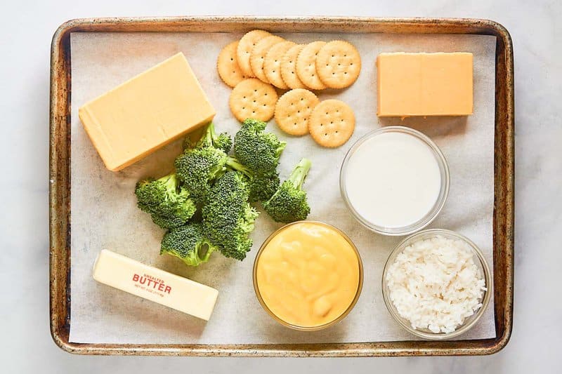 Copycat Cracker Barrel broccoli cheese casserole ingredients on a tray.