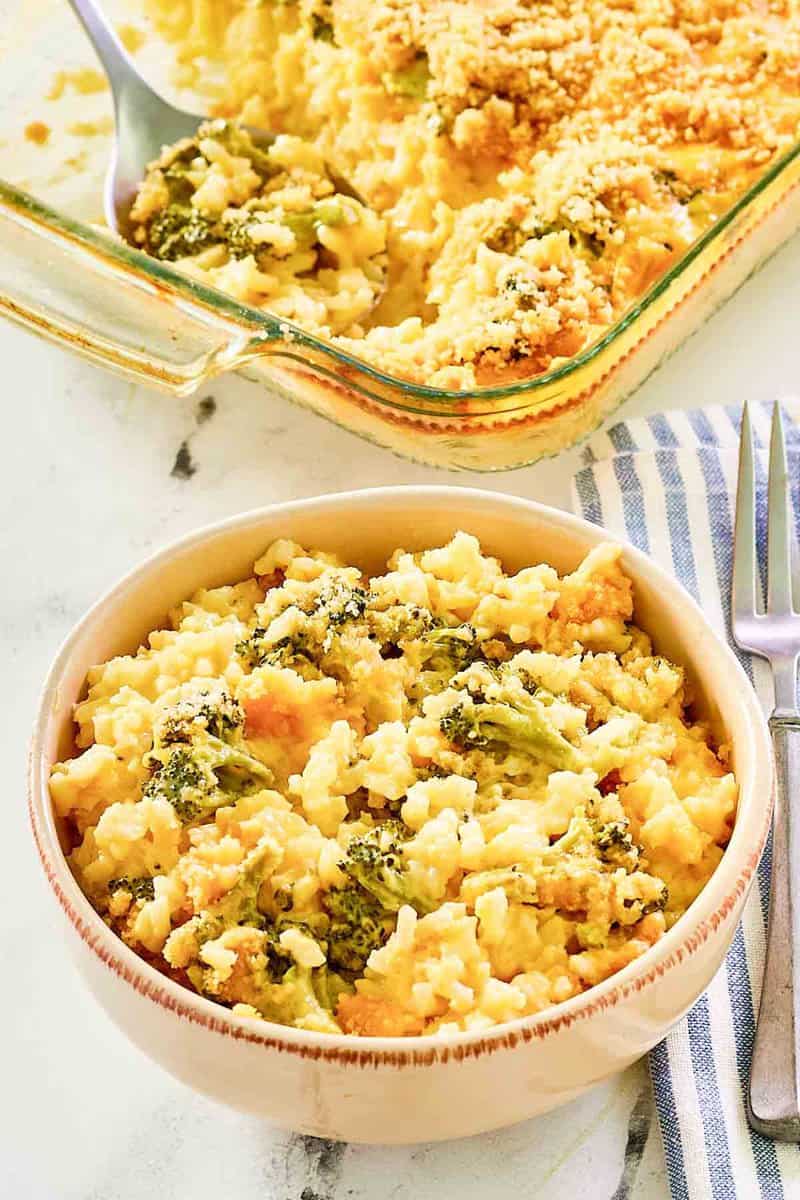 Copycat Cracker Barrel broccoli cheese rice casserole in a bowl and baking dish.