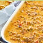 Hamburger dip with velveeta and rotel in a serving dish.