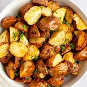 Roasted red potatoes in a bowl.