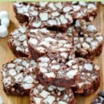 Homemade rocky road candy pieces on a serving board.