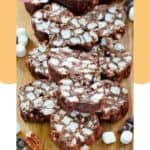 Homemade rocky road candy on a wood board.