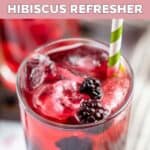 Copycat Starbucks very berry hibiscus refresher with a straw.