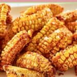 Air fried corn ribs on a plate.
