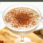 Brandy Alexander with ice cream with cocoa powder sprinkled on top.
