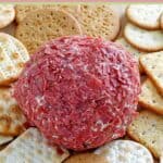 Dried beef cheese ball surrounded with crackers.