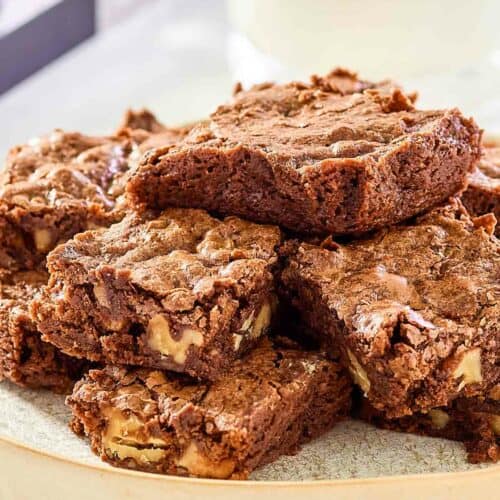 Hershey's brownies piled on a plate.