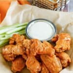 Homemade Hooters wings in a serving basket.