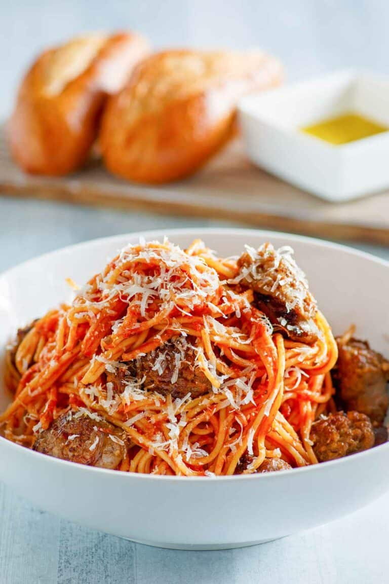 Instant Pot spaghetti and sausage in a pasta bowl.