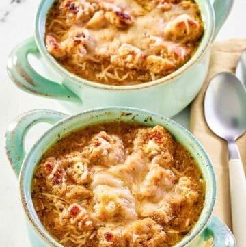 Copycat Panera French onion soup in two bowls.