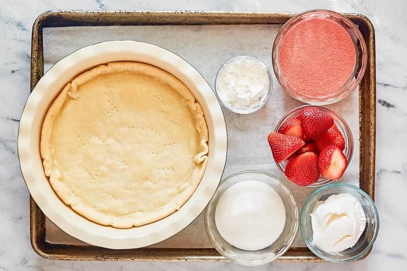 Copycat Shoney's strawberry pie ingredients on a tray.