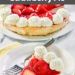 A slice of homemade Shoney's strawberry pie garnished with whipped cream on a plate.