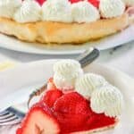 A slice of homemade Shoney's strawberry pie and a fork on a plate.