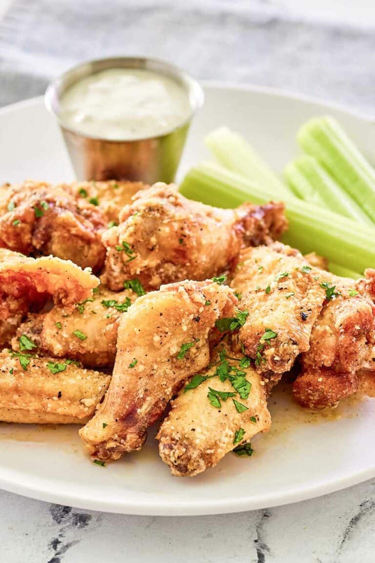 Copycat Wingstop garlic parmesan wings on a plate.