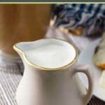 A small pitcher of homemade French vanilla creamer on a table.