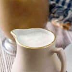 DIY French vanilla creamer in a small pitcher.