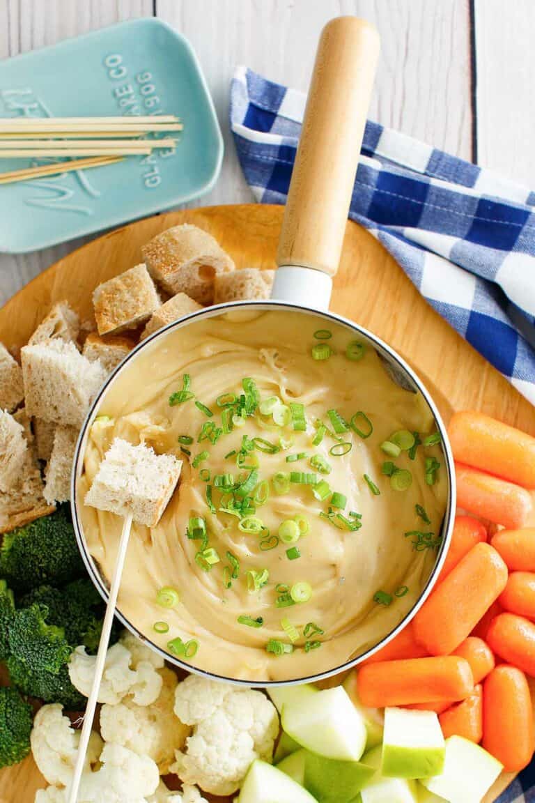 Copycat Melting Pot Wisconsin trio cheese fondue and assorted dippers.