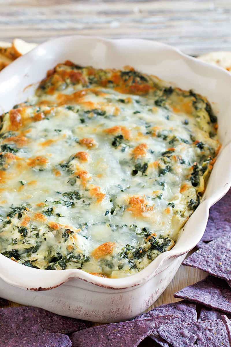 Copycat Olive Garden spinach artichoke dip in a baking dish.