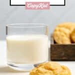 A snickerdoodle cookie and a glass of milk.
