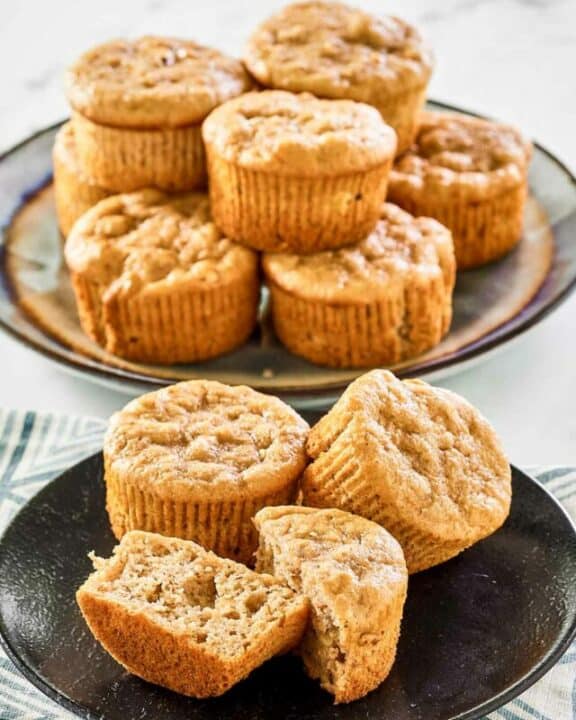 Banana nut muffins on plates.