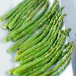 Air fried asparagus on a platter.