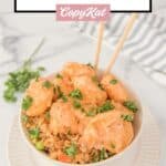 A bowl of air fryer bang bang shrimp and fried rice.