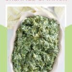Copycat Boston Market creamed spinach in a rectangular serving dish.